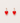 Red heart-shaped earrings on a light gray background