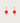 Pair of earrings with red flower-shaped charms on a light gray background