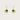 Heart-shaped green earrings with gold hooks on a light beige background