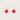 Pair of earrings with pink and red leaf-like charms on gold hooks against a light gray background